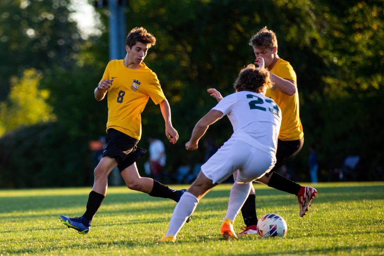 East's Alessandro Saccani looks to challenge the ball Tuesday, Oct. 4, 2022, at Zeeland East High School.