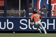 Baltimore Orioles center fielder Ryan McKenna makes a fielding error on a ball hit by New York Yankees' Aaron Judge during the first inning of a baseball game on Saturday, Sept. 4, 2021, in New York. (AP Photo/Adam Hunger)