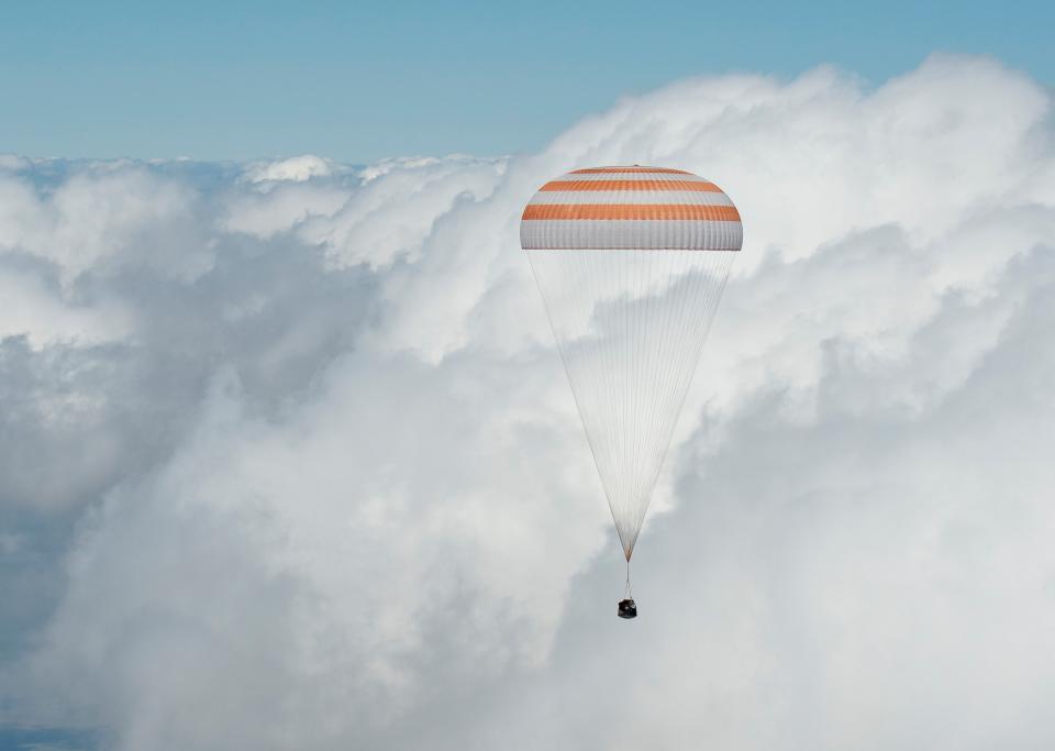 The Soyuz TMA-19M space capsule carrying British astronaut Tim Peake, NASA astronaut Tim Kopra and Russian cosmonaut Yuri Malenchenko is seen as it lands near the town of Zhezkazgan, Kazakhstan on Saturday, June 18, 2016