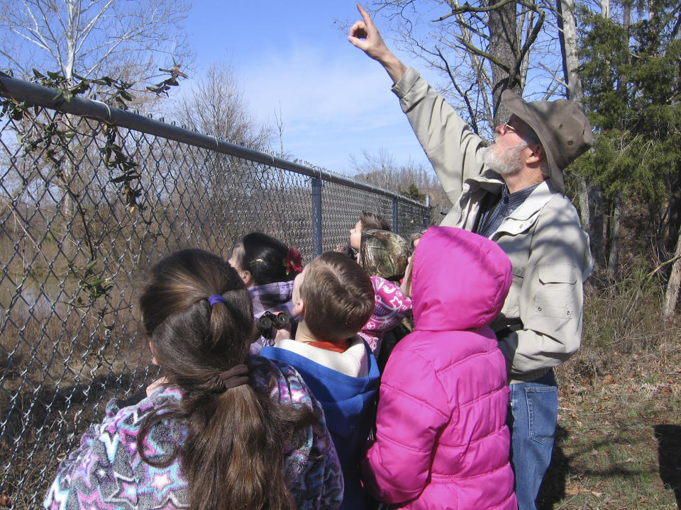 This image provided by Steve Kistler shows Kistler teaching third-graders at the Cub Run, Kentucky, Elementary School about birds during the Great Backyard Bird Count in February 2012. The count is a citizen science project that collects data used by researchers to track bird populations. (Steve Kistler/Janet Kistler via AP)