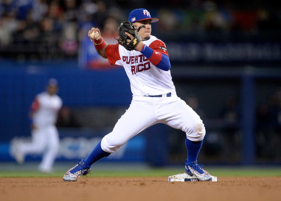 Puerto Rico infielder Javier Baez (9) throws to first during the 2017 World Baseball Classic. Baez, from Arlington Country Day School in Jacksonville, is scheduled to compete in this month's tournament.