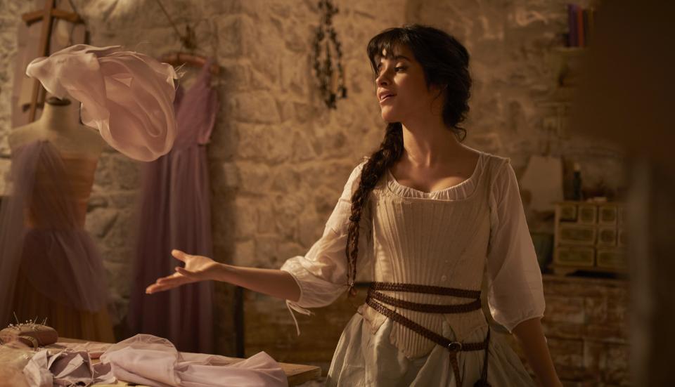 Camila Cabello dressed in rags in Cinderella. Image via Amazon Prime Video