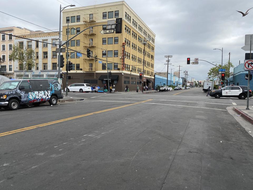 Outside the Fred Jordan Missions, at the intersection of 7th Street and Towne Avenue. “Normally this corner is full as the homeless line up, but right now much of it is shut down,” says Raines.