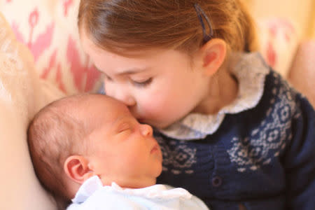 Britain's Princess Charlotte and her brother Prince Louis are seen in this photograph released by Kensington Palace, and taken by Britain's Catherine, Duchess of Cambridge, on Princess Charlotte's third birthday, at Kensington Palace in London, Britain May 2, 2018. Picture taken May 2, 2018. Catherine, Duchess of Cambridge/Courtesy of Kensington Palace/Handout via REUTERS