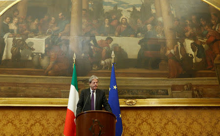 Italian Prime Minister-designate Paolo Gentiloni speaks to journalists at the end of a meeting in the Low Chamber in Rome, Italy December 12, 2016. REUTERS/Remo Casilli