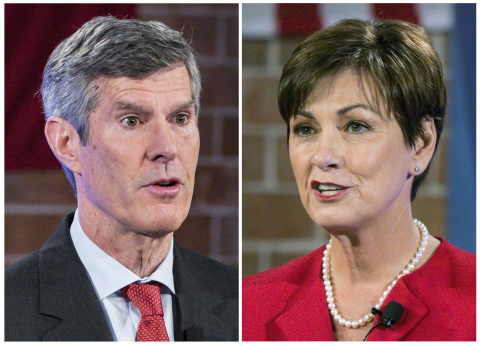 FILE - This combination of Oct. 10, 2018, file photos show Iowa Democratic gubernatorial candidate Fred Hubbell, left, and Iowa Republican Gov. Kim Reynolds during a debate in Des Moines. (Rodney White/Des Moines Register via AP, Pool, File)