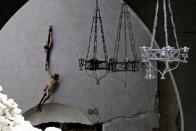 <p>A broken crucifix hangs inside the damaged church of Santa Maria della Misericordia in Accumoli, central Italy, Wednesday, Aug. 24, 2016, after a magnitude 6 quake struck at 3:36 a.m. (0136 GMT) and was felt across a broad swath of central Italy, including Rome where residents of the capital felt a long swaying followed by aftershocks. (AP Photo/Andrew Medichini) </p>