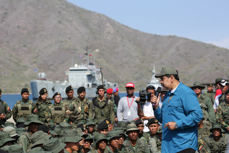 Venezuela's President Nicolas Maduro speaks to soldiers while he attends a military exercise in Turiamo, Venezuela February 3, 2019. Miraflores Palace/Handout via REUTERS