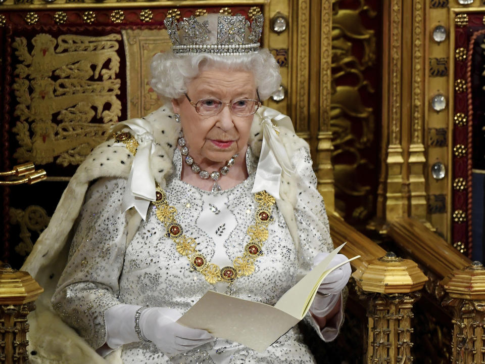 Britain's Queen Elizabeth II delivers the Queen's Speech during the official State Opening of Parliament in London, Monday Oct. 14, 2019. (Toby Melville/Pool via AP)