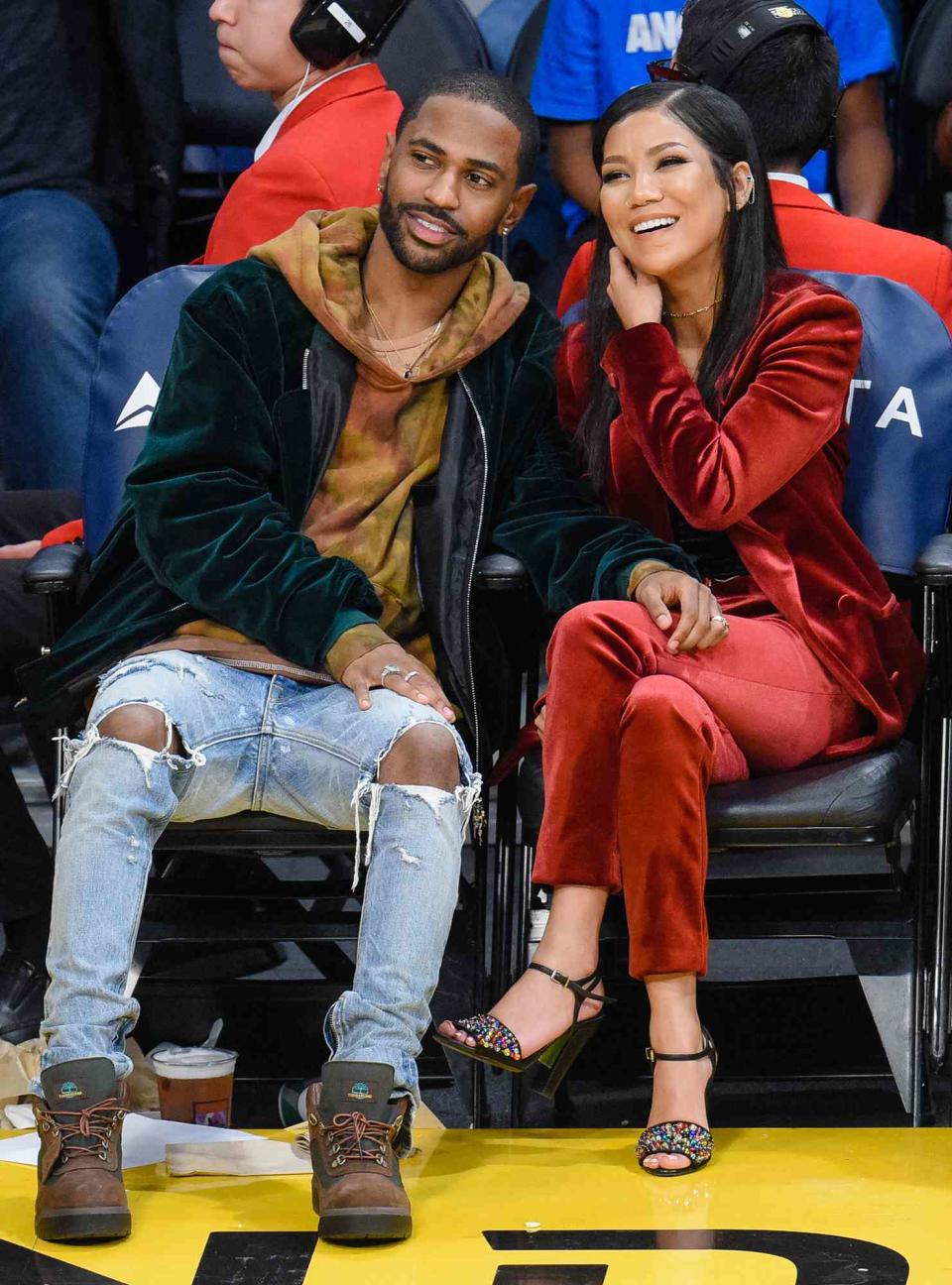 Big Sean (L) and Jhene Aiko attend a basketball game between Utah Jazz and the Los Angeles Lakers at Staples Center on December 5, 2016 in Los Angeles, California