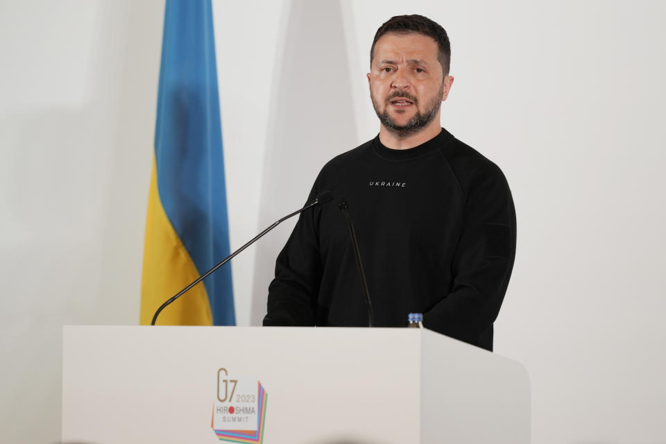 Ukrainian President Volodymyr Zelenskyy speaks during a news conference at the Group of Seven nations' summit in Hiroshima, western Japan, Sunday, May 21, 2023. (AP Photo/Louise Delmotte, Pool)