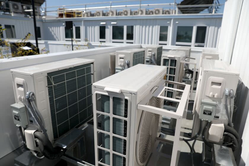 LOS ANGELES, CA - MARCH 09: Air conditioning units on the rooftop of Hope on Broadway, a newly built four-story permanent supportive housing project with a total of 48 apartment units for chronically homeless individuals, along the 5100 block of S Broadway on Thursday, March 9, 2023 in Los Angeles, CA. Mayor of Los Angeles Karen Bass attended the grand opening event. Total development cost: $27,500,000. (Gary Coronado / Los Angeles Times)