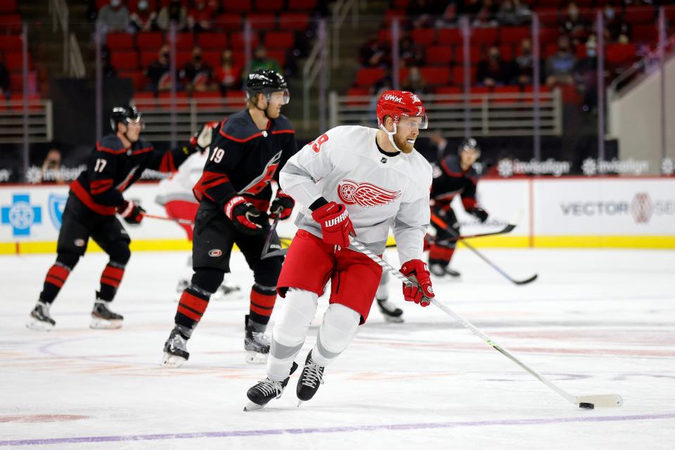 Anthony Mantha of the Detroit Red Wings skates with the puck during the first period of their game against the Carolina Hurricanes at PNC Arena on March 4, 2021, in Raleigh, North Carolina.