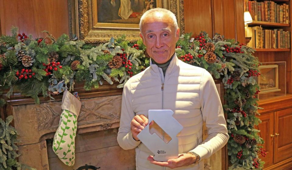 Andrew Ridgeley with his trophy for Christmas No 1 2023 (Official Charts)