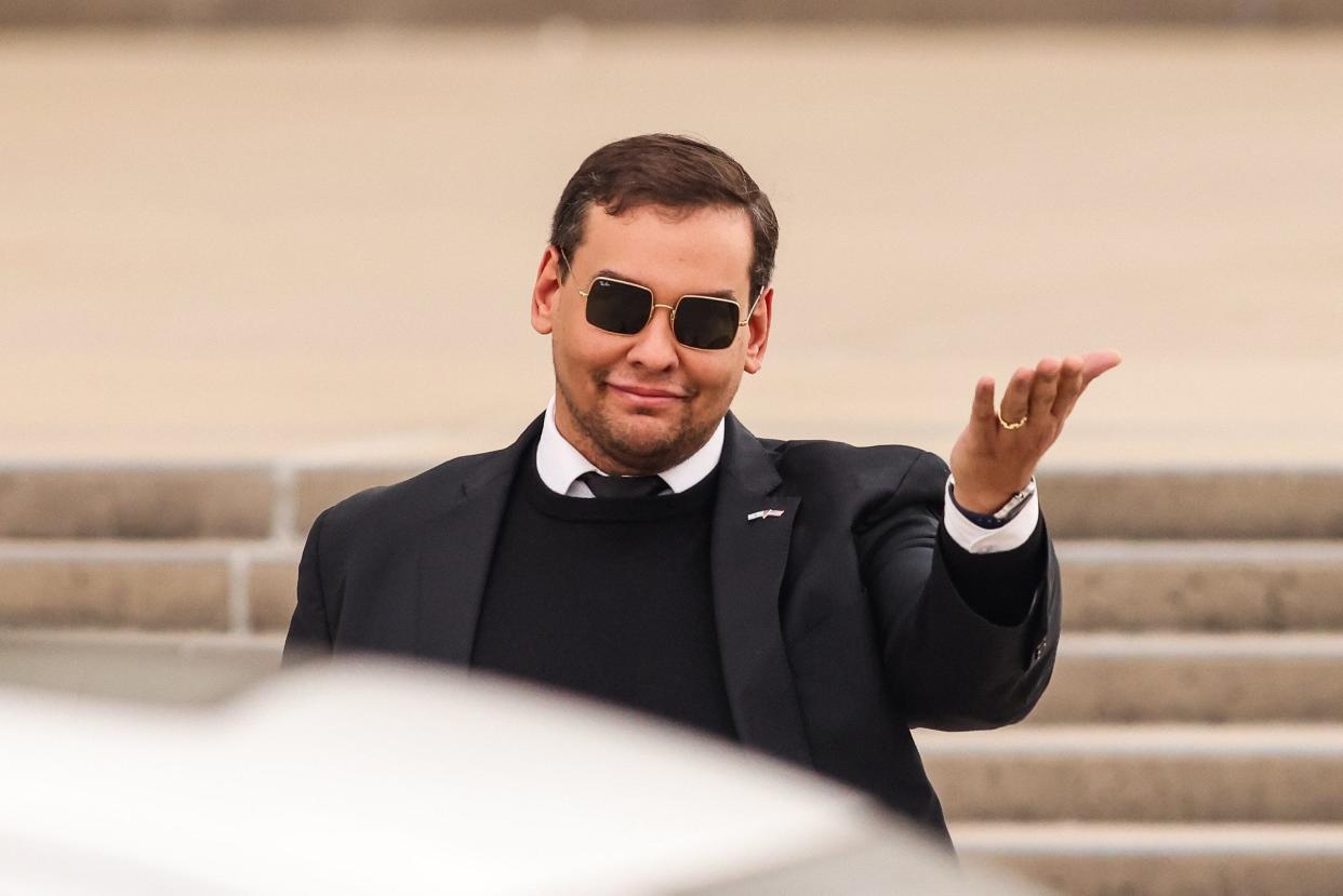 Representative George Santos leaves the Alfonse M. D'Amato United States Federal Courthouse after his appearance in Central Islip, New York on Oct. 27, 2023.