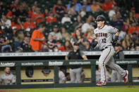 Arizona Diamondbacks' Daulton Varsho (12) runs down the third base line after hitting a two-run home run against the Houston Astros during the 10th inning of a baseball game Saturday, Sept. 18, 2021, in Houston. (AP Photo/David J. Phillip)