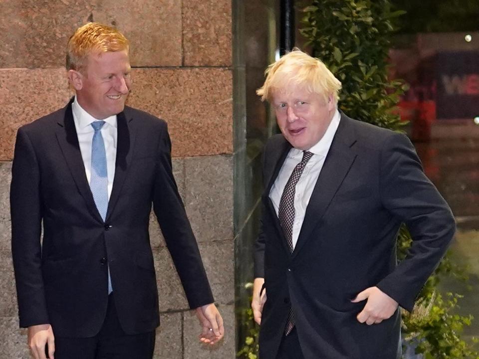 Oliver Dowden welcomes Boris Johnson to the Conservative party conference last October