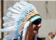 A supporter of the Argentine national soccer team, a participant of the World Cup, smiles during a gathering in central Moscow, Russia June 15, 2018. REUTERS/Gleb Garanich