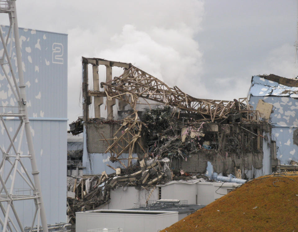 In this March 15, 2011 photo taken and provided by Tokyo Electric Power Co. (TEPCO), smoke billows from Unit 3 reactor building after an explosion at Fukushima Dai-ichi nuclear power plant in Okuma, Fukushima prefecture, following the March 11 tsunami and earthquake. The March 2011 catastrophe in Japan has set off a flurry of independent films telling the stories of regular people who became overnight victims, stories the creators feel are being ignored by mainstream media and often silenced by the authorities. Nearly two years after the quake and tsunami disaster, the films are an attempt by the creative minds of Japan’s movie industry not only to confront the horrors of the worst nuclear disaster since Chernobyl, but also as a legacy and to empower the victims by telling their story for international audiences. (AP Photo/Tokyo Electric Power Co.) EDITORIAL USE ONLY