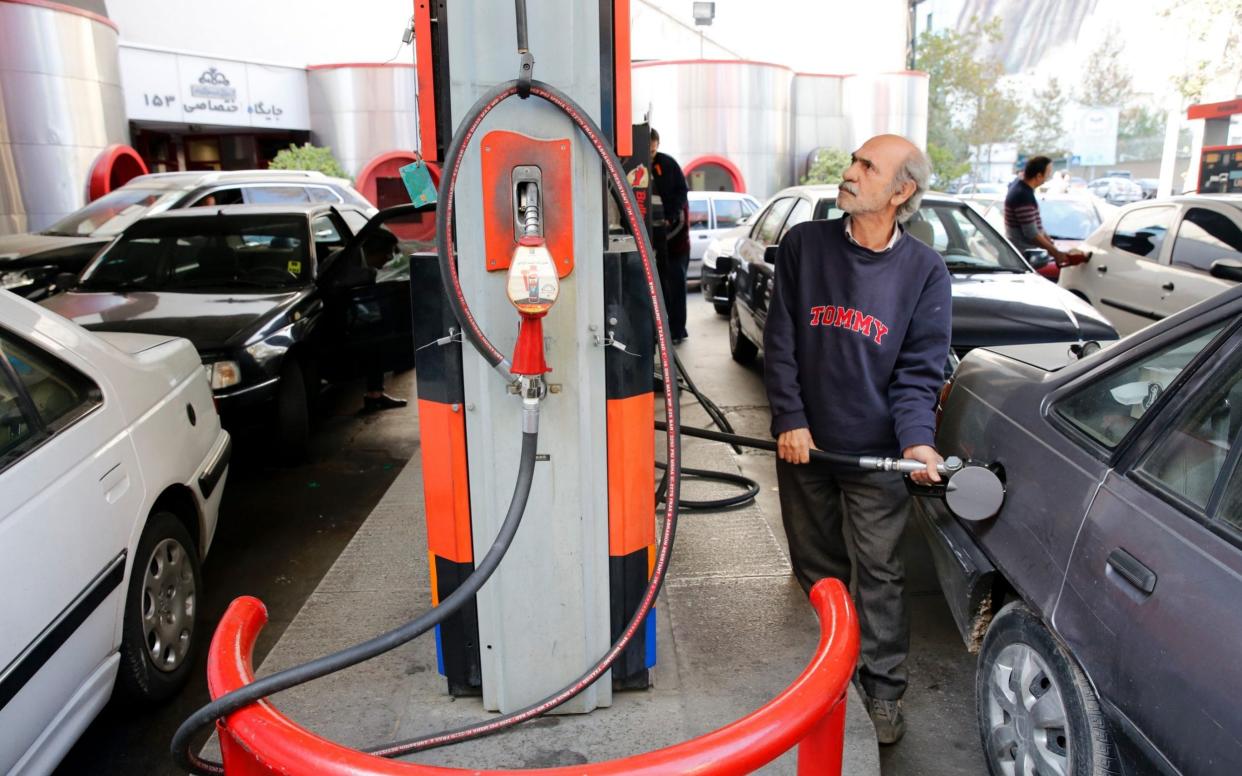 Iranians fill their cars and motorcycle at a petrol station in Tehran, Iran, 15 November 2019. Media reported that due to the ongoing economic crisis Iranian government has increased fuel prices up to 50 percent - REX