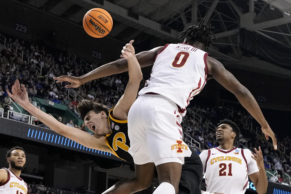 Pittsburgh forward Guillermo Diaz Graham is fouled by Iowa State forward Tre King during the first half of a first-round college basketball game in the NCAA Tournament on Friday, March 17, 2023, in Greensboro, N.C. (AP Photo/Chris Carlson)