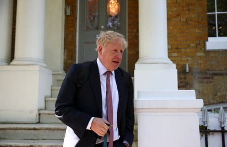 Former British Foreign Secretary Boris Johnson leaves his home in London