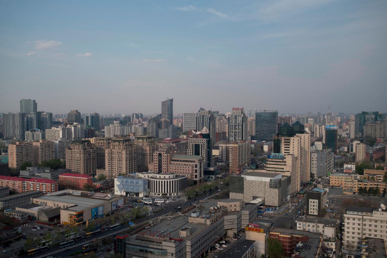 <p>A general view of Beijing on 11 April, 2018. The city added 33 billionaires last year</p> (AFP via Getty Images)