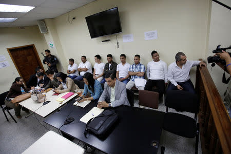 The detainees charged with the murder of indigenous environmental activist Berta Caceres arrive to court for their trial, in Tegucigalpa, Honduras November 29, 2018. REUTERS/Jorge Cabrera