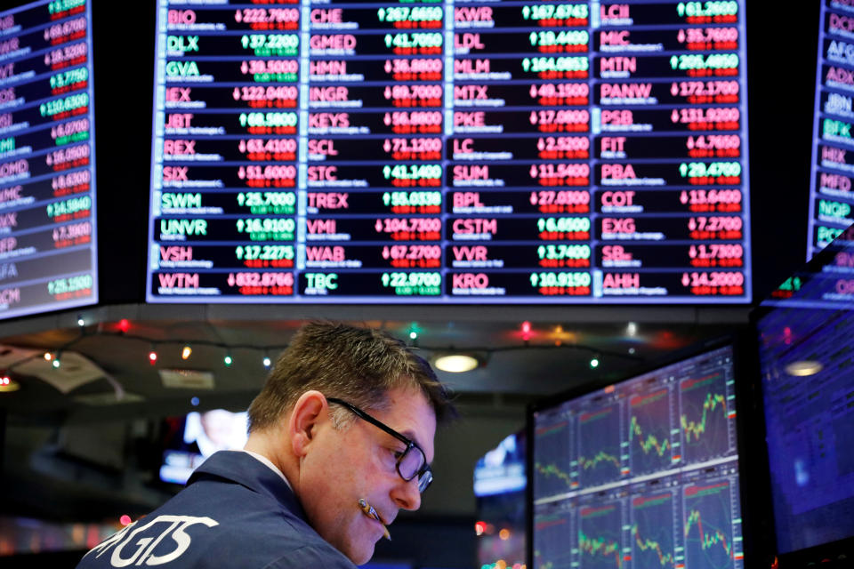 A trader works on the floor of the New York Stock Exchange shortly after the opening bell in New York, U.S., December 24, 2018.  REUTERS/Lucas Jackson      TPX IMAGES OF THE DAY