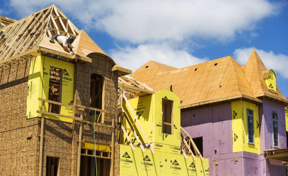 <p>A construction worker works on a new house being built in a suburb located north of Toronto in Vaughan, Ontario, Canada on June 29, 2015. REUTERS/Mark Blinch/File Photo </p>