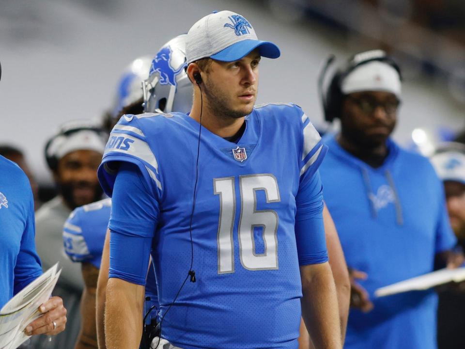 Jared Goff stands on the sidelines during a Lions preseason game in 2021.