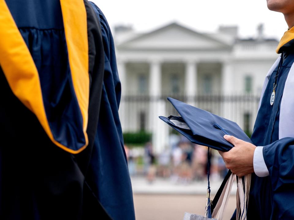 Graduate students in front of White House.