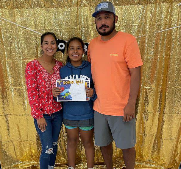 PHOTO: Lexi and her parents Kimberly and Felix Rubio at the morning awards ceremony at Robb Elementary. (Rubio Family)