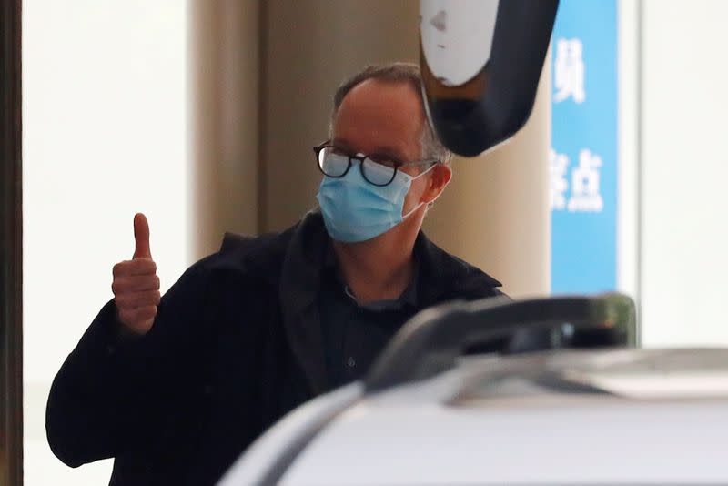 WHO team member tasked with investigating the origins of the coronavirus disease (COVID-19) pandemic leaves quarantine hotel in Wuhan