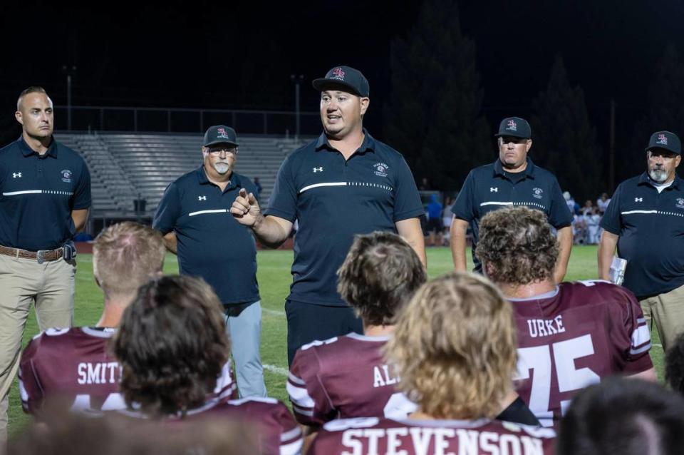 Bear River coach Tanner Mathias talks with the team after the game against the Tamalpais Red Tailed Hawks on Sept. 14.