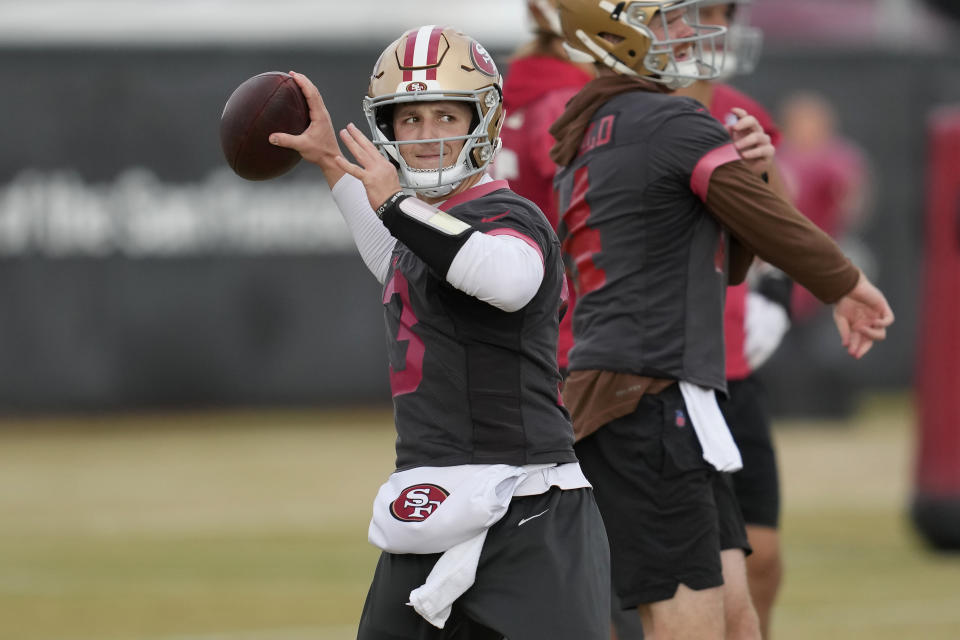 San Francisco 49ers quarterback Brock Purdy passes during an NFL football practice in Santa Clara, Calif., Wednesday, Jan. 24, 2024. The 49ers are scheduled to play the Detroit Lions Sunday in the NFC championship game. (AP Photo/Jeff Chiu)