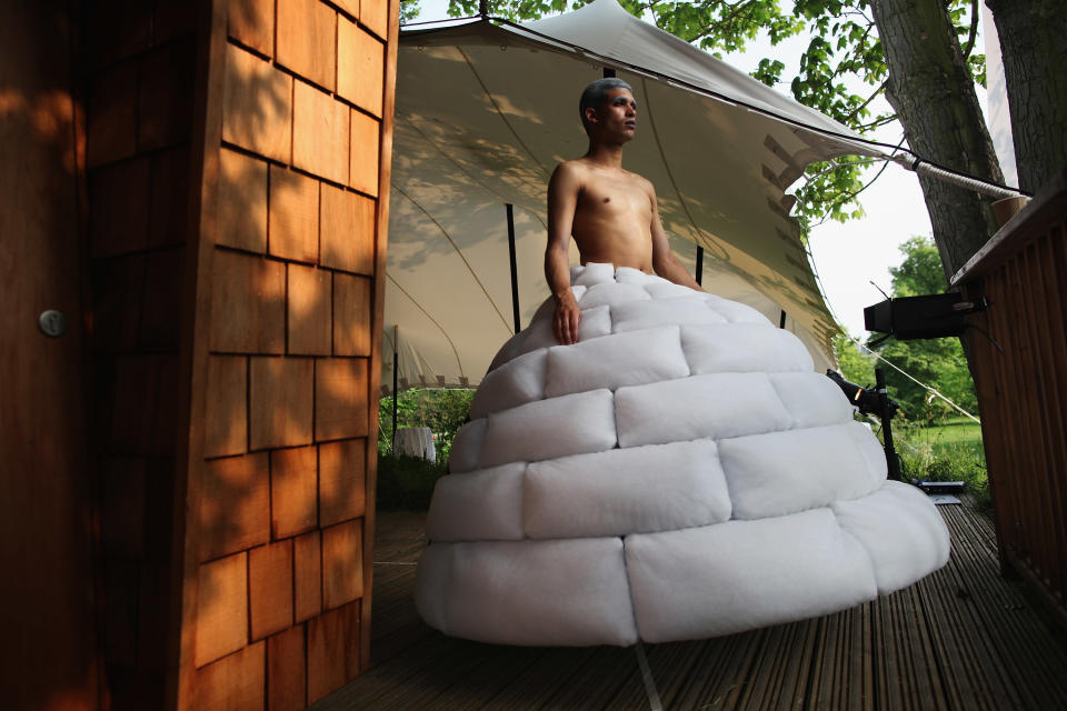 A model dons an 'Igloo Dress' by designers English Eccentrics ahead of a fashion show and auction at WWF Pandamonium 2012 in Hyde Park, London.