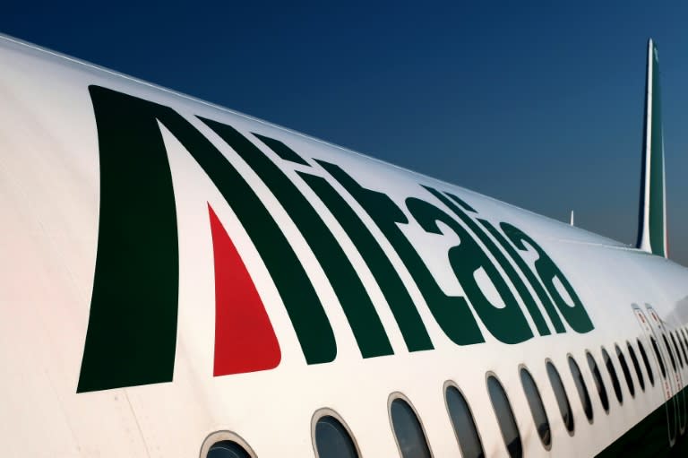 Troubled airline Alitalia is planning to make 2,400 staff redundant and cut some salaries by almost a third, trade union sources said