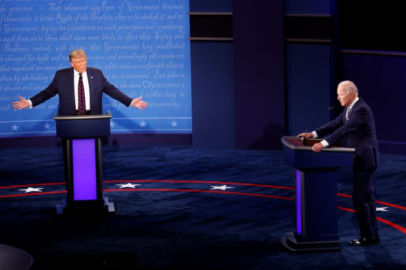 U.S. President Donald Trump and Democratic presidential nominee Joe Biden participate in their first 2020 presidential campaign debate in Cleveland