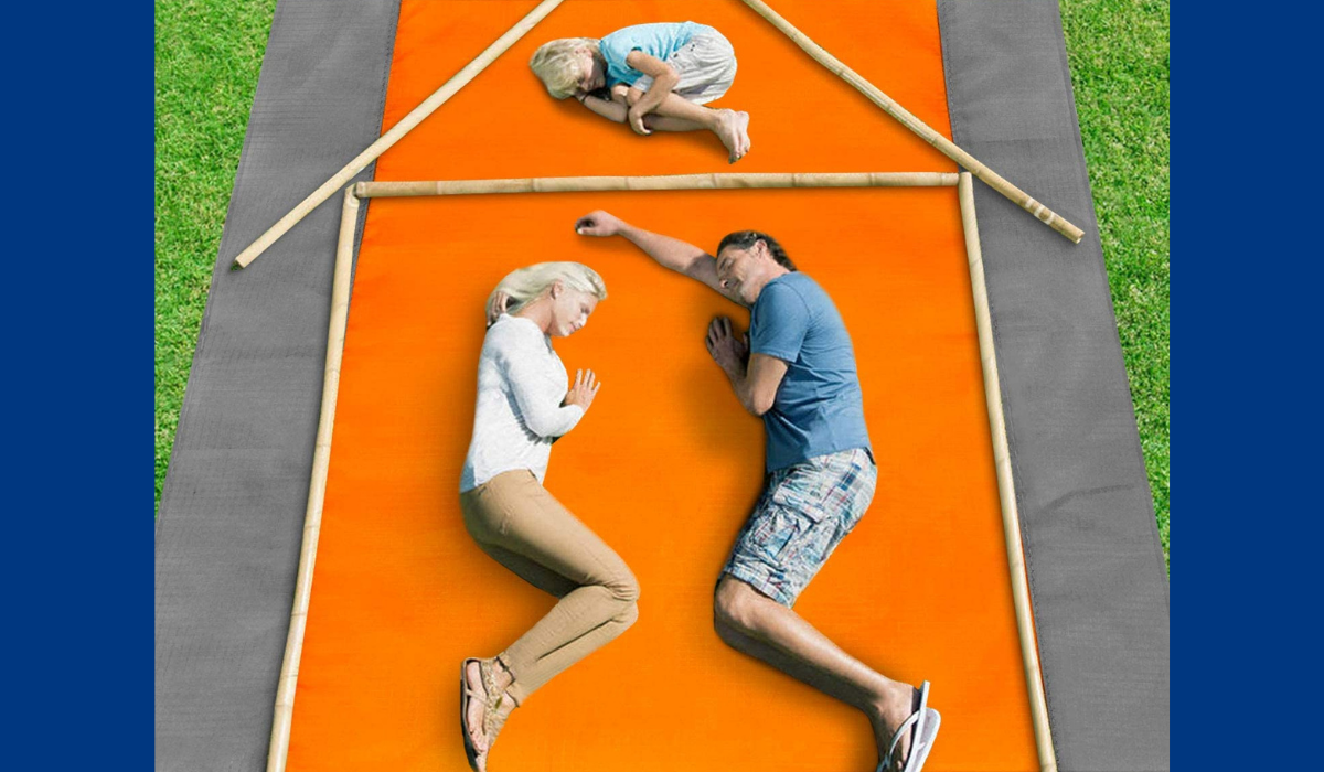 a family on the orange beach blanket