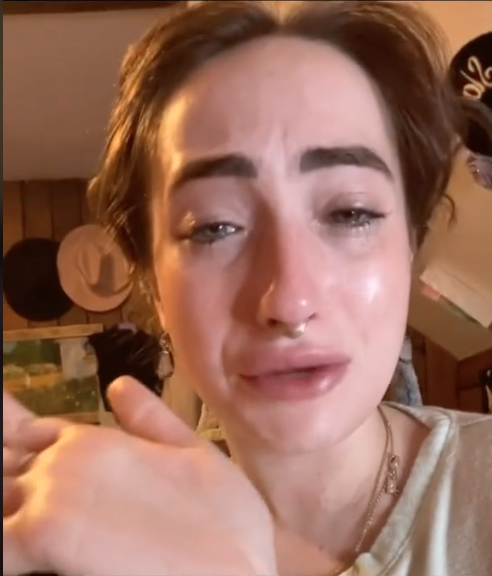 Carli Bellmer crying after swallowing an AirPod