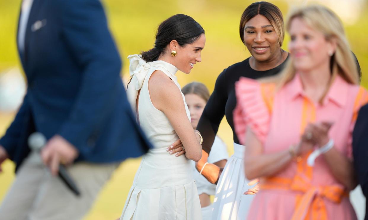 <span>Meghan Markle, Duchess of Sussex, centre, with Serena Williams and other guests at the 2024 Royal Salute Polo Challenge in Wellington, Florida.</span><span>Photograph: Rebecca Blackwell/AP</span>