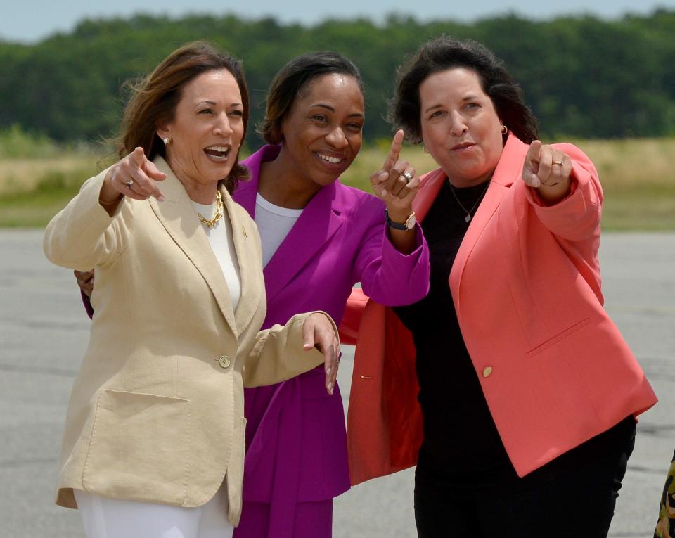 Vice President Kamala Harris, Attorney General Andrea Campbell and Lt. Gov. Kim Driscoll, left to right, acknowledge the group assembled under the wing of Air Force Two.
Vice President Kamala Harris arrived at Air Station Cape Cod Saturday, July 20, 2024. Air Force Two landed shortly before 1 p.m. at the Coast Guard air station. She was greeted by a group of officials before getting into a vehicle for a caravan to Provincetown. Harris attended a fundraiser at the Pilgrim Monument Saturday afternoon. 
Merrily Cassidy/Cape Cod Times