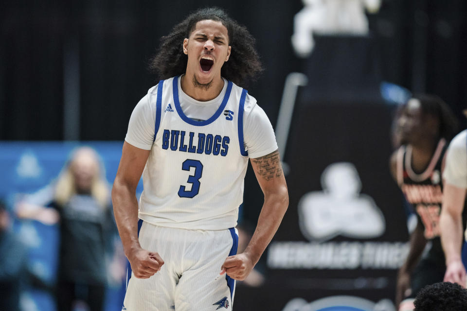 North Carolina Asheville guard Tajion Jones (3) reacts during the second half of the Big South Championship NCAA college basketball game against Campbell on Sunday, March 5, 2023, in Charlotte, N.C. (AP Photo/Jacob Kupferman)