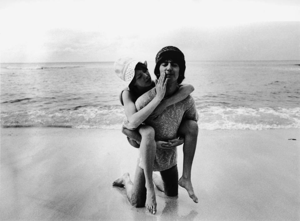 <p>George Harrison of the Beatles, with his model wife Patti Boyd, during their honeymoon in Barbados.</p>