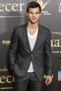 Taylor Lautner kept his look smart/casual. Copyright [Splash]