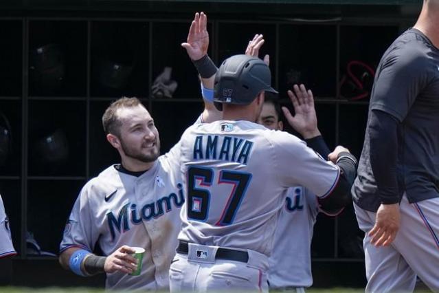 Marlins finish sweep of Nationals 4-2, move 10 over .500 for first time  since 2011