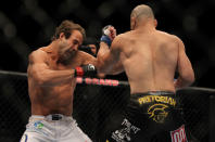 LAS VEGAS, NV - MAY 26: Glover Teixeira (right) punches Kyle Kingsbury during a light heavyweight bout at UFC 146 at MGM Grand Garden Arena on May 26, 2012 in Las Vegas, Nevada.