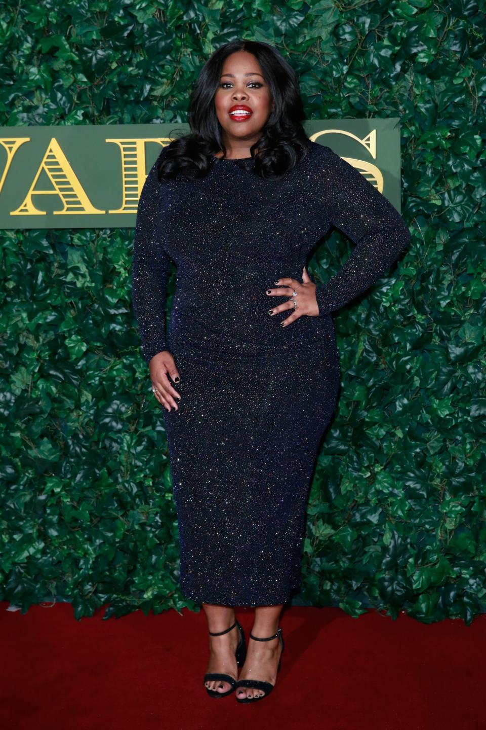 <p>The American actress (best known for her role in <i>Glee</i>) donned a glittery tight-fitting dress with matching sandals and that all important red lip. <i>[Photo: Getty]</i> </p>