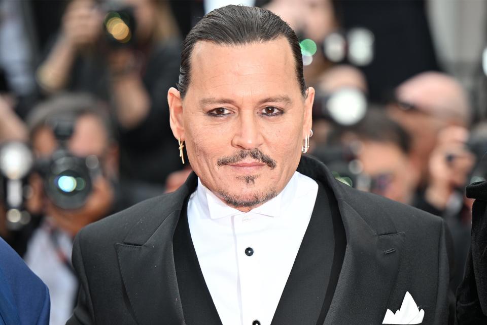 CANNES, FRANCE - MAY 16: Johnny Depp attends the "Jeanne du Barry" Screening & opening ceremony red carpet at the 76th annual Cannes film festival at Palais des Festivals on May 16, 2023 in Cannes, France. (Photo by Stephane Cardinale - Corbis/Corbis via Getty Images)